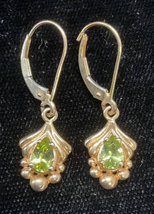Vintage 14k Yellow Gold Semiprecious Earrings: Vintage 14k yellow gold earrings with green semiprecious stone earrings. Marked 14k. Signed UP. Measure approx 5/8 inches long. Total weight 2.2 grams. Some wear including scratching observed. Jewelry