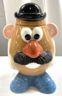 CLAY ART MR POTATO HEAD Porc Cookie Jar W Lid 1998: Underside reads CLAY ART MR POTATO HEAD HAND PAINTED. Cookie jar is porcelain. Piece depicts Toy Story character Mr. Potato Head. Jar includes lid. Piece is hand painted. Piece measures approximately