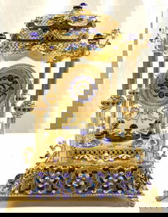 Viennese Gold Pltd Enamel & Pearl Mntd Clock: Vintage possibly antique, Viennese Gold plated mantel clock. Museum quality piece intricately detailed and ornately designed. Blue enamel, semi precious stones, pearls etching, scrollwork, cloisonne,