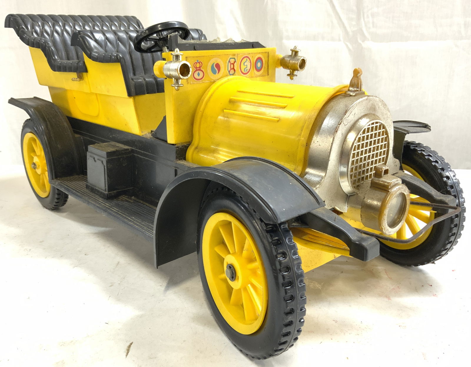 REMCO INDUSTRIES Vntg Model Car USA: Underside reads REMCO INDUSTRIES. MADE IN USA. Model car is black & yellow toned. Piece is plastic. Model car is vintage, measures approximately 19 inches deep 9 inches tall 8 inches deep. Model car,