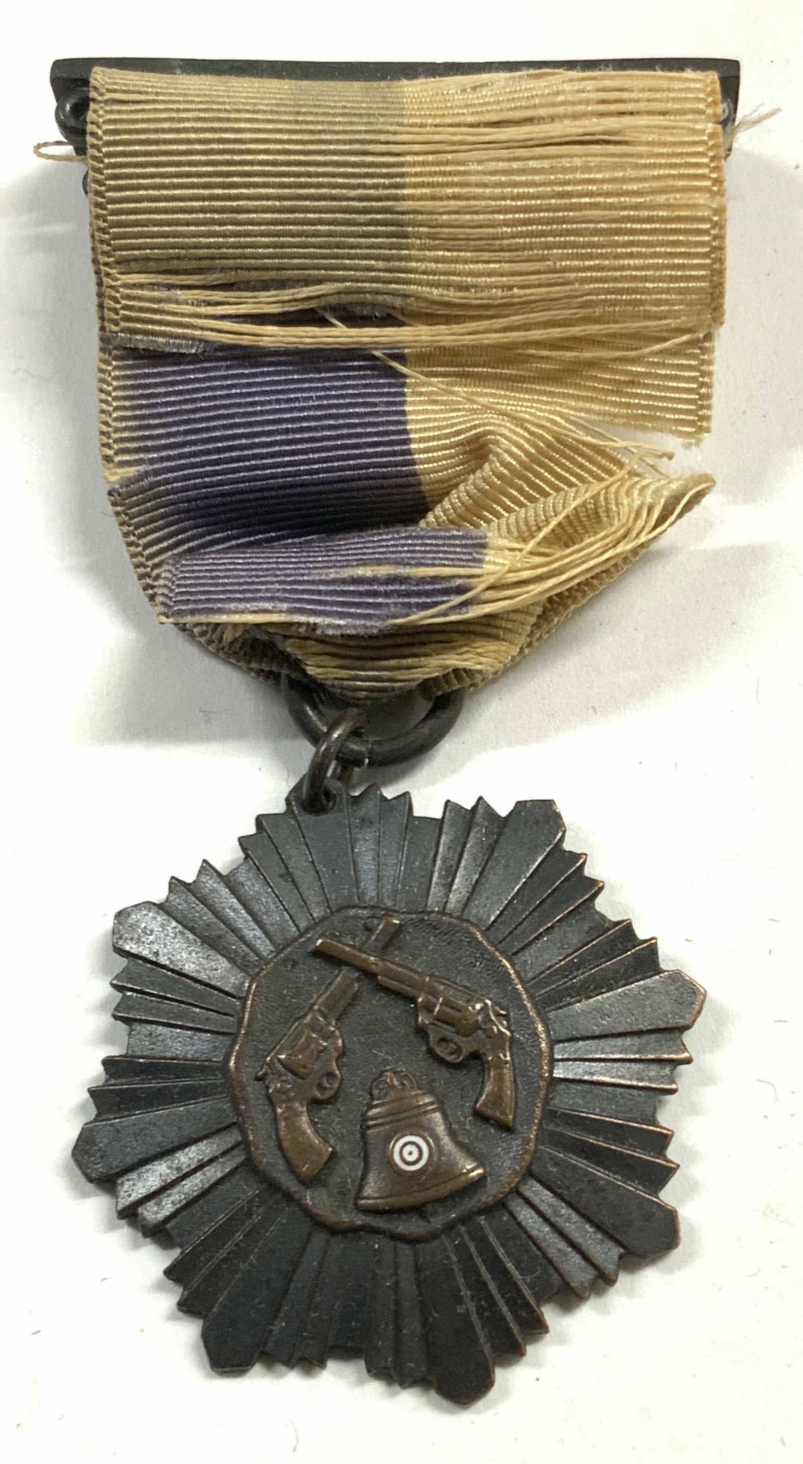 USMA Vintage Military Service Member Medal: Backside monogrammed illegibly. Top of ribbon reads TRIGGER CLUB. United States Military Academy Medal. Piece has crossing revolver detail & Liberty bell. Piece has cream & blue toned ribbon. Piece me