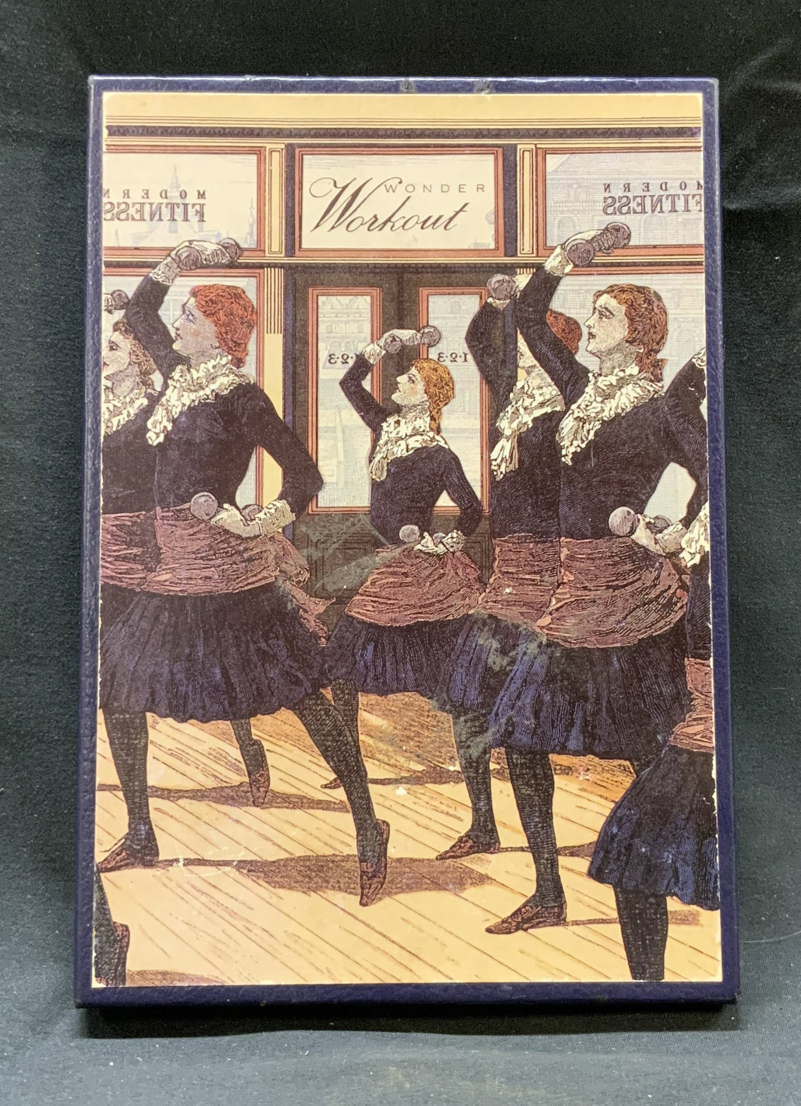 Wonder Workout Dexterity Game 1991 USA: Wonder Workout Game. Interior reads c1991 H Ramsey for Parvenue Inc Made in USA. Inspired by a dexterity puzzle, the game has beads and has illustrations of women holding dumbbells. Some discoloration