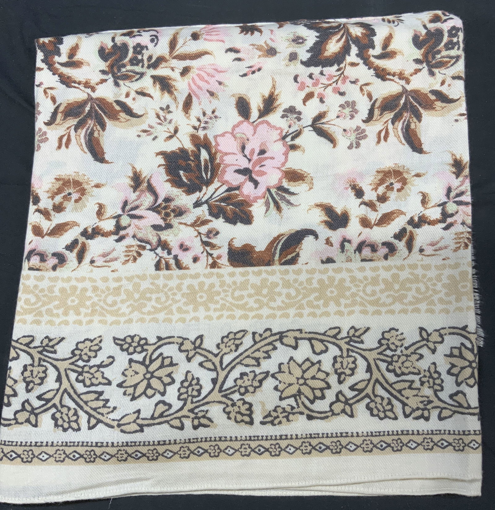 Nine West Floral Shawl: Nine West Floral Shawl. Cream-colored shawl with colorful floral designs throughout it. Colors like pink, brown, tint of green. As well as a floral stem border throughout the shawl. Tagged Nine West. 
