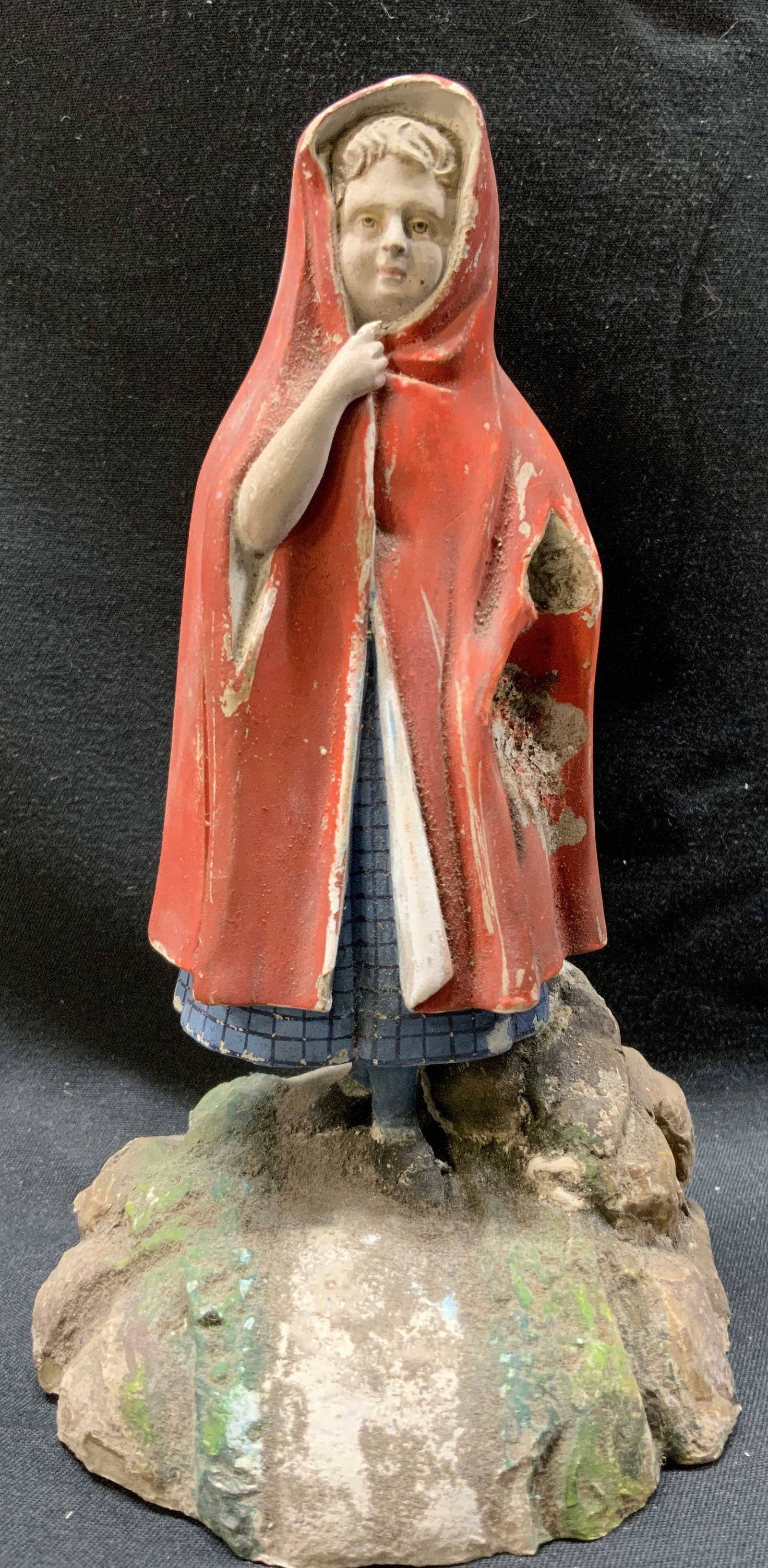 Antique Chalkware Little Red Riding Hood Figural: Antique Chalkware Little Red Riding Hood Figural Little red riding hood figural wearing a red hooded cape & blue striped dress. Appears to be missing an arm & is standing on a rock form platform. Surf