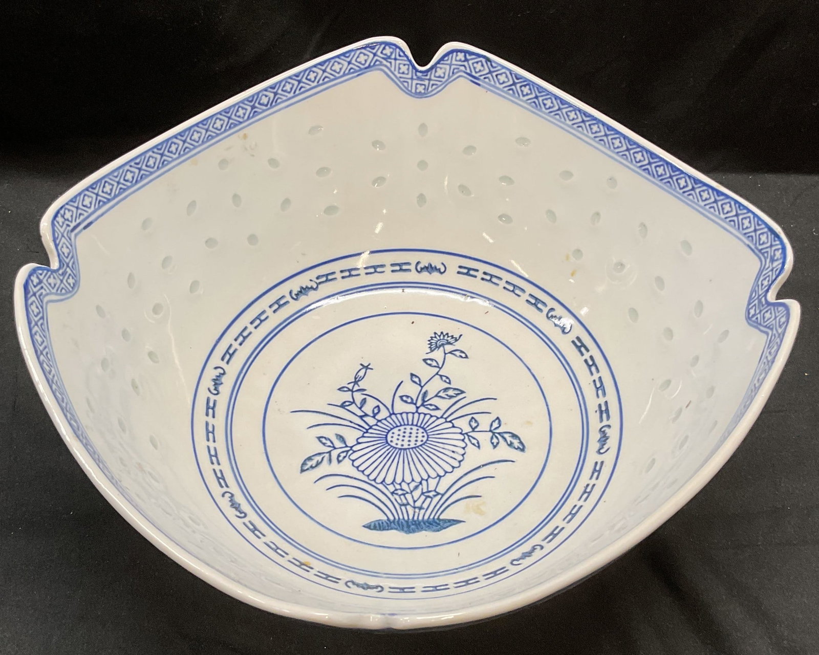 Sgn Chinese Porcelain Blue & White Floral Bowl: Chinese porcelain bowl in blue and white and floral motif and raised dot pattern. Measures approx 9.5 x 9.5 x 4.25 inches. Signed on underside. Some wear including scratching.
