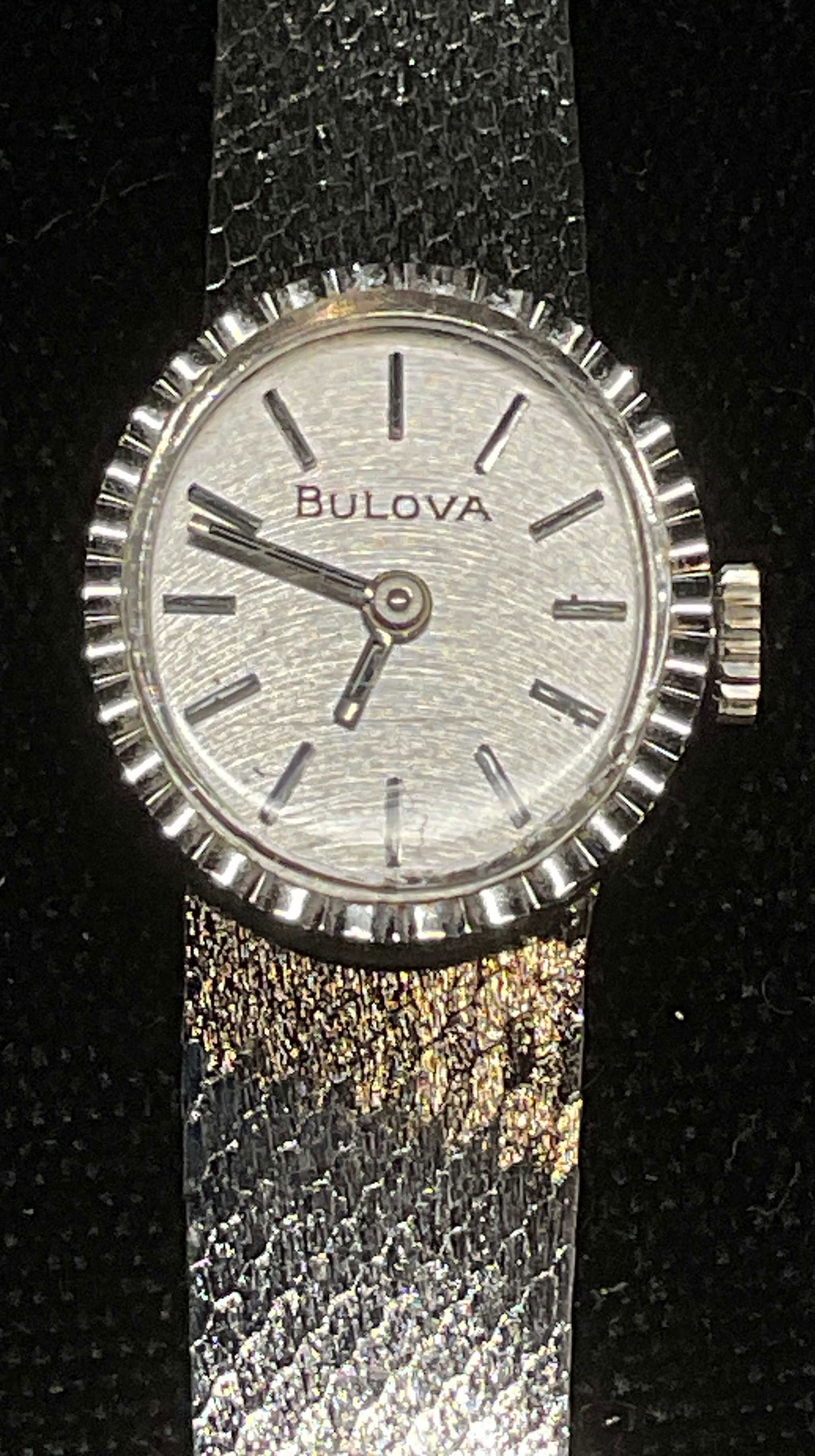 Vintage Bulova Stainless Steel Watch: Vintage Bulova stainless steel watch with mesh chain band. Signed on dial. Total length approx 6.25 inches. Includes box. Not tested for function. Some wear including scratching observed. Jewelry, est