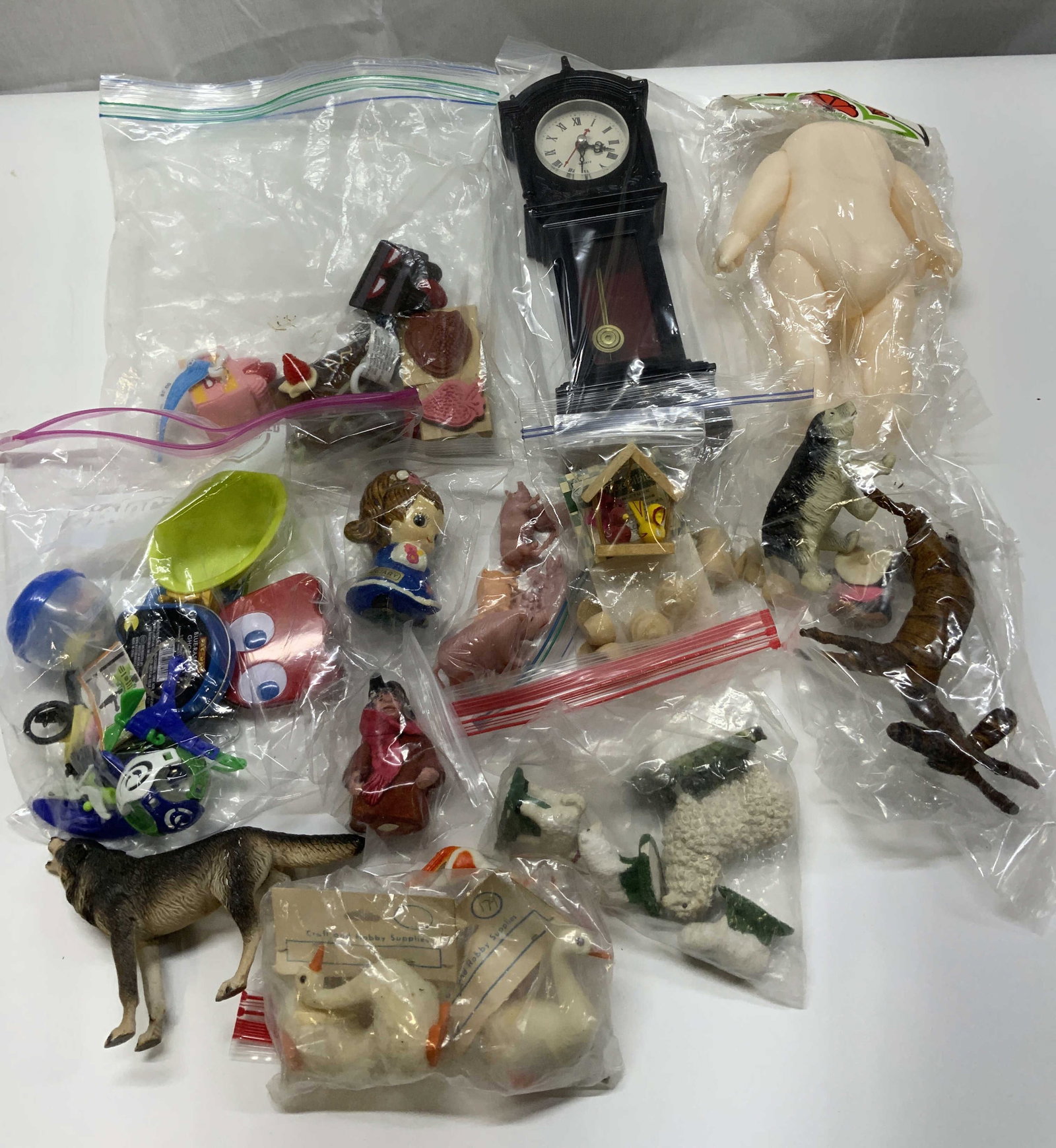 Group Lot Vintage 20+ Doll/Doll House/Figures+More: Group Lot Vintage 20+ Doll/Doll House/Figures+More 20+ doll pieces, toys, doll furniture, figures & more. Lot is being sold as is. Pieces have not been individually examined. Surface wear consistent w