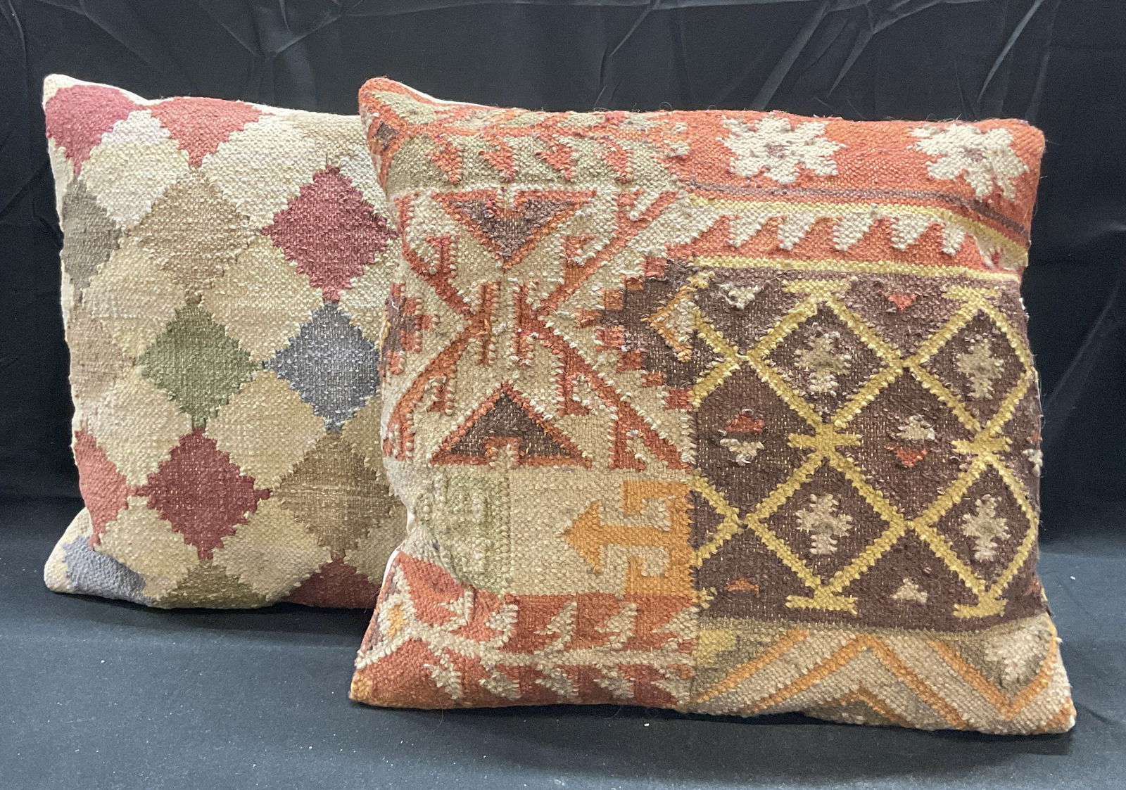 Pair Grandin Road Woven Wool Panel Pillows: Pair of Grandin Road woven wool panel pillows with beige backing. Wool and cotton. Geometric patterns. Measure approx 17 x 17 inches. Both pieces have wear including pilling and blemishes. Grandin roa