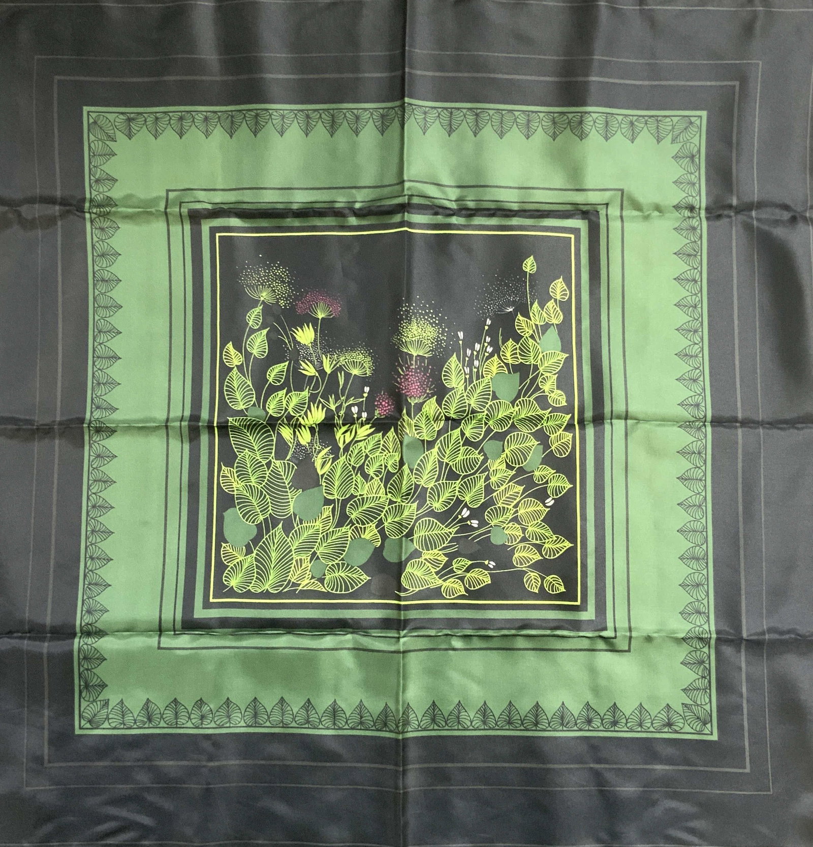 TOTES Japan Floral Rain Scarf W Packaging: Packaging reads TOTES RAIN SCARF. Scarf is black tight green toned geometric & leaf detail. Scarf is polyester. Piece measures approx 28 x 28 inches as reads on tag. Scarf, polyester scarf, totes scar