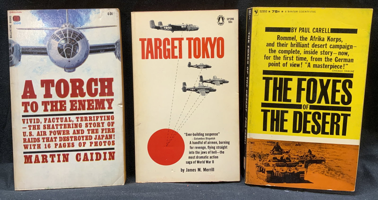 Lot 3 Vintage Military Fiction Books 1960s: Lot 3 Vintage Military Fiction Books 1960s 3 paperback military fictions books including, A Torch To The Enemy by Martin Caidin, The Foxes of The Desert by Paul Carell, Target Tokyo by James M.Merrill