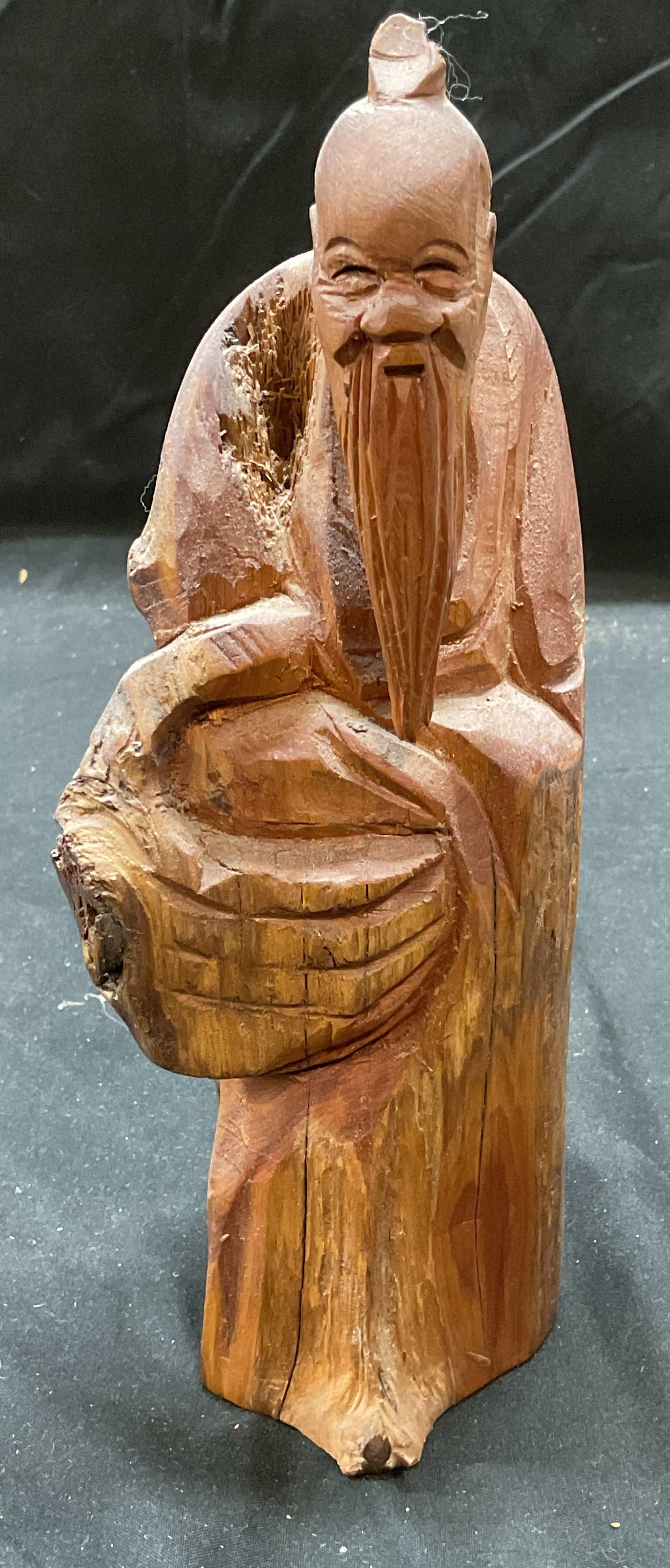 Signed Carved Wood Asian Figural: Signed carven wooden Asian figural. Elder man. Signed on underside. Measures approx 3 x 9 inches. Some scratching and chips. Wood figural, Asian figural, carved wood figural, home decor, home accessor