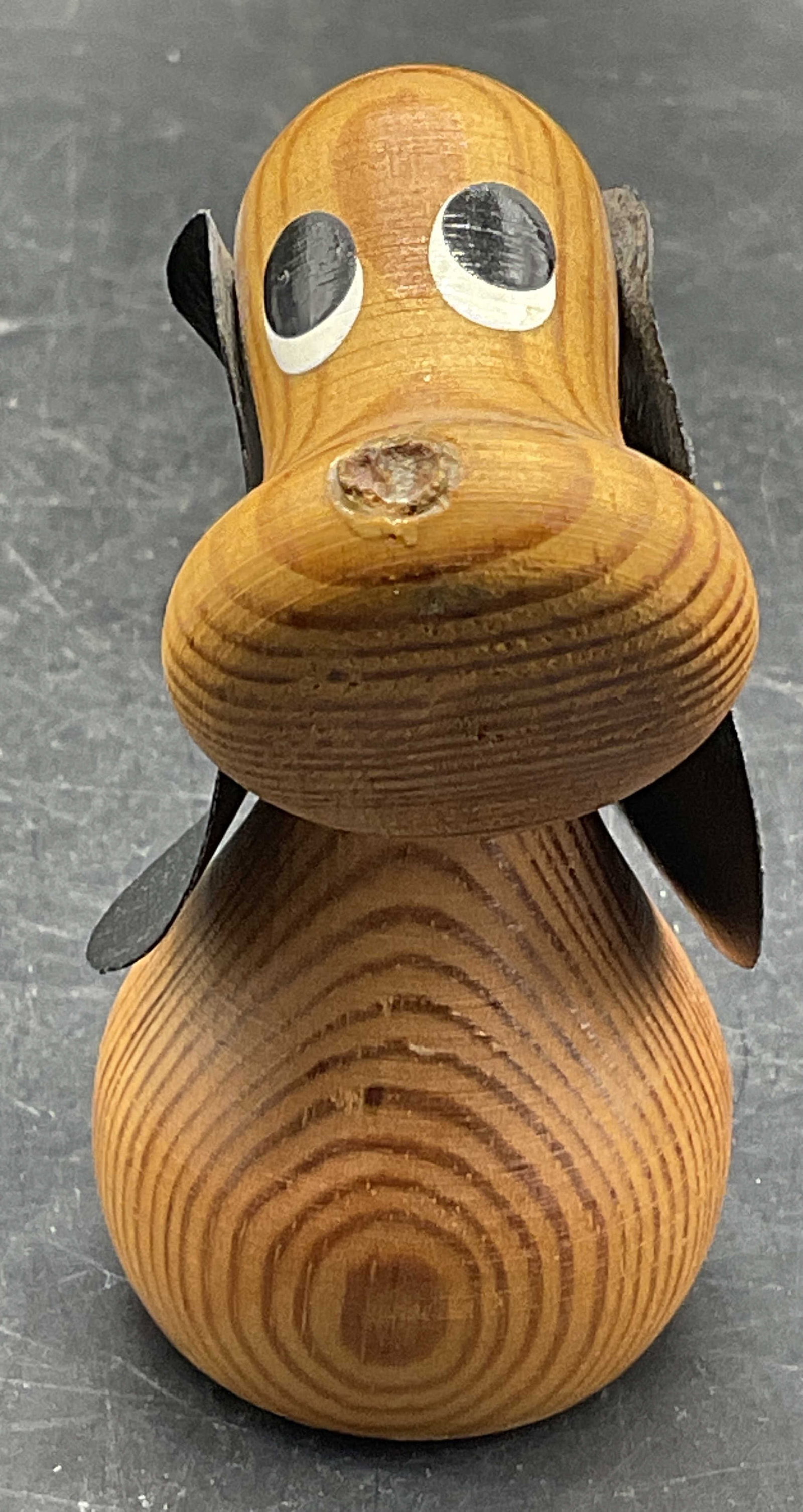EWA STUDAK Vintage Handmade Wood & Leather Dog: EWA STUDAK Vintage Handmade Wood & Leather Dog Figural. Measures approx. 3.25H x 1.5W in. Sticker to underside reads EWA STUDAK, other verbiage illegible. Chipping and losses present. home decor, home