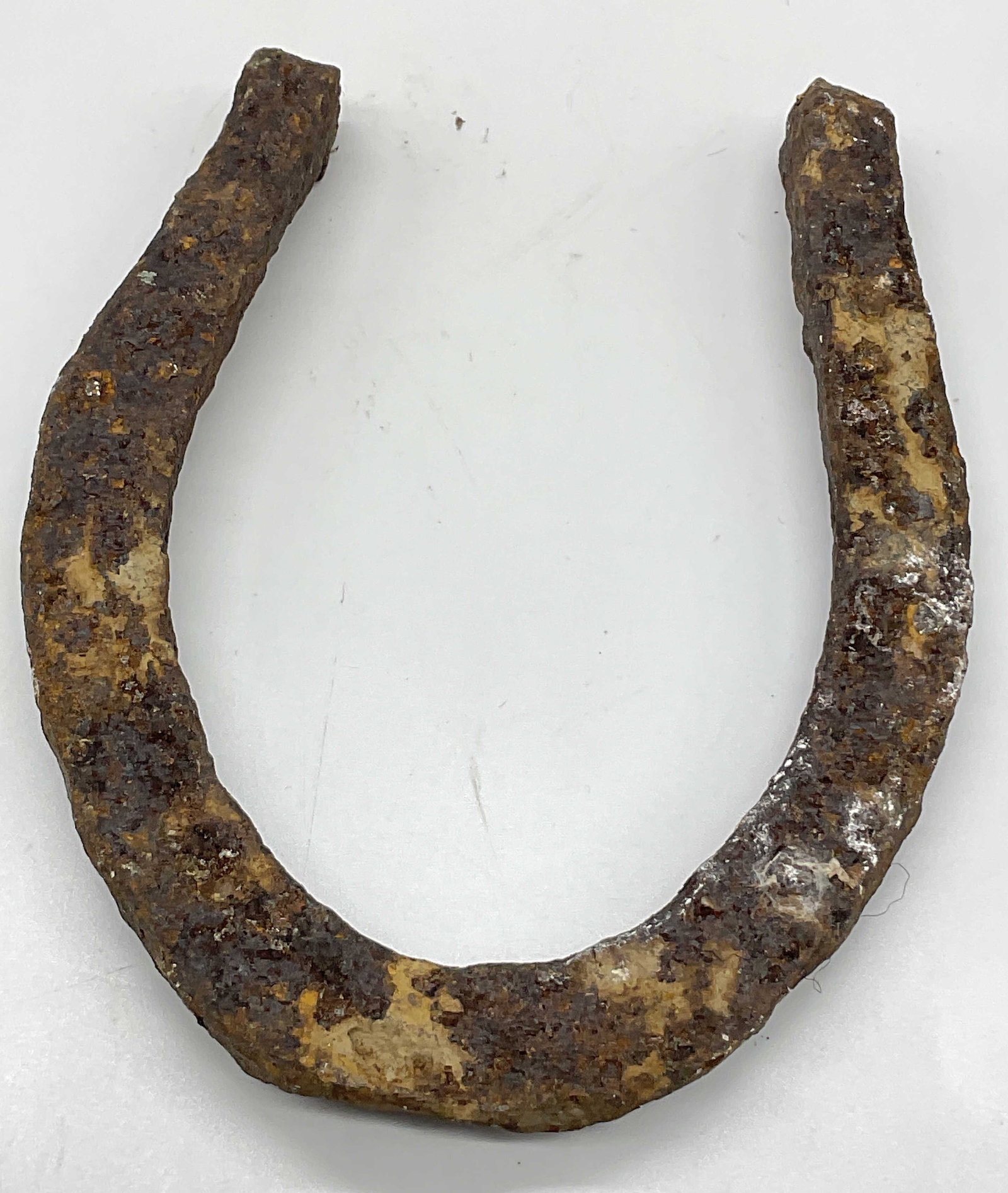 Vintage Metal Horseshoe: Vintage Metal Horseshoe. U shaped horseshoe. Measures approx. 4.75W x 6.5L in. Evident wear and residue to the piece. home decor, home accents, homewares, housewares, home accessories, collectibles, D
