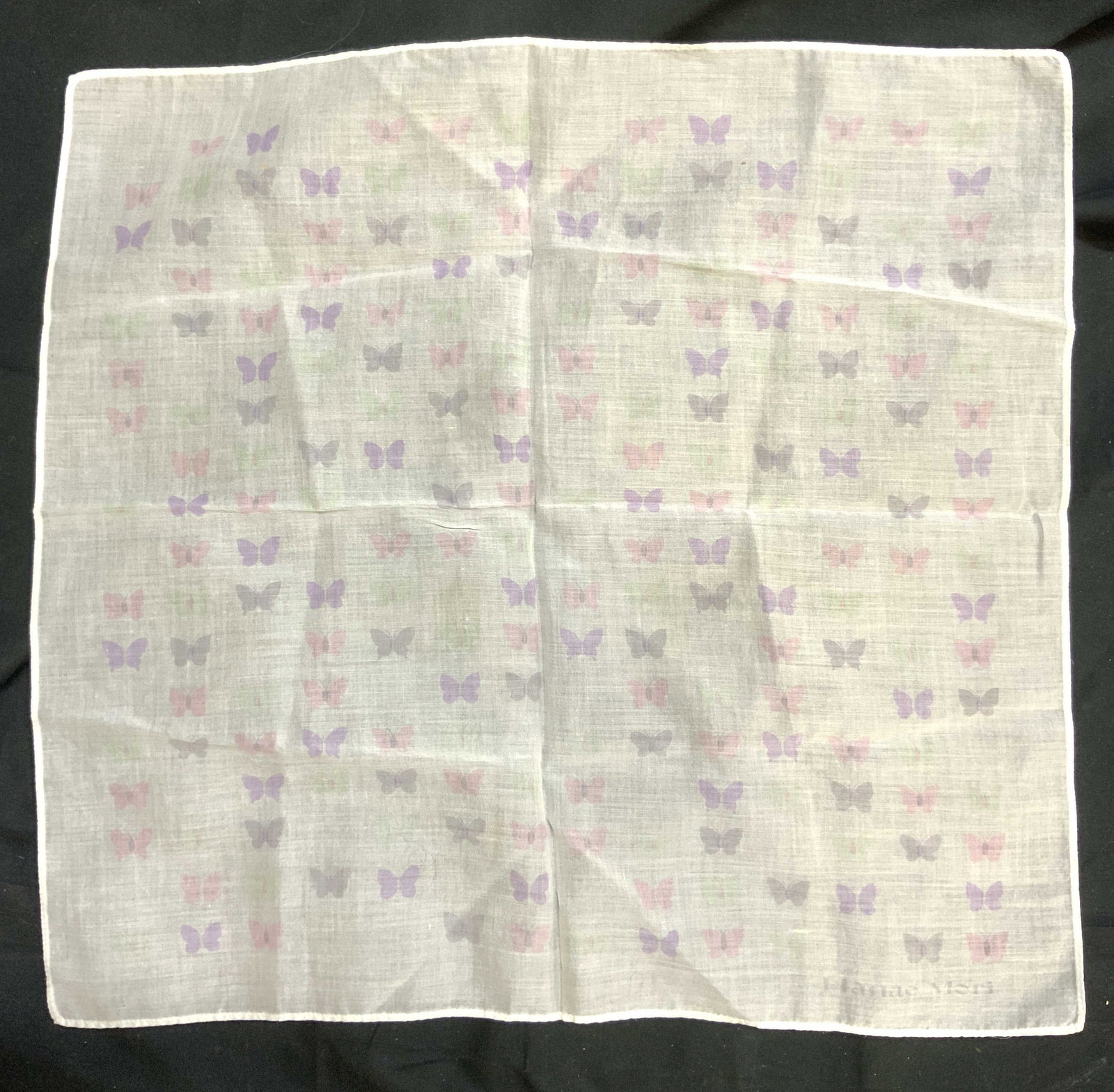 Hanae Mori Butterfly Pattern Handkerchief: Handkerchief is signed HANAE MORI. Piece is white with multi toned butterfly pattern detail. Piece has square form. Handkerchief measures approximately 16 inches square. Handkerchief, butterfly patter