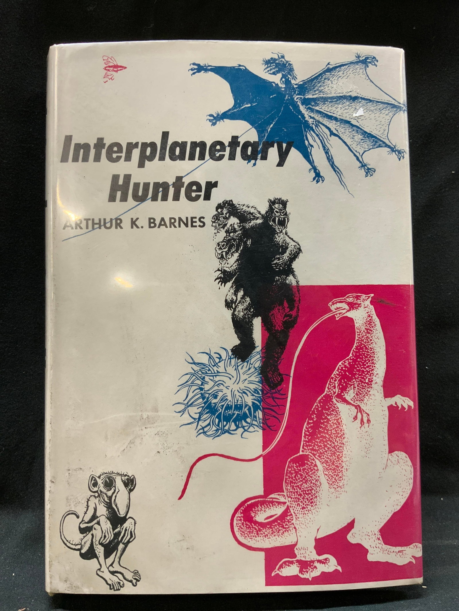 Interplanetary Hunter Illustr First Edition 1956: Interplanetary Hunter Illustrated First Edition 1956 Hardcover science fiction book by Arthur K. Barnes. Interplanetary Hunter. FIRST EDITION. Published in 1956. Front cover has illustrations. Surface