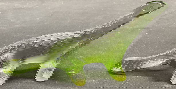 Lalique Crystal Komodo Dragon Figurine France: Lalique green crystal Komodo dragon figurine. Signed on underside. Made in France. Measures approx 6.25 x 2.25 x 2.75 inches. Some scratching observed. Lalique, Lalique figurine, Lalique Komodo