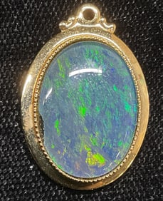 Gold Tone Faux Green Cabochon Pendant