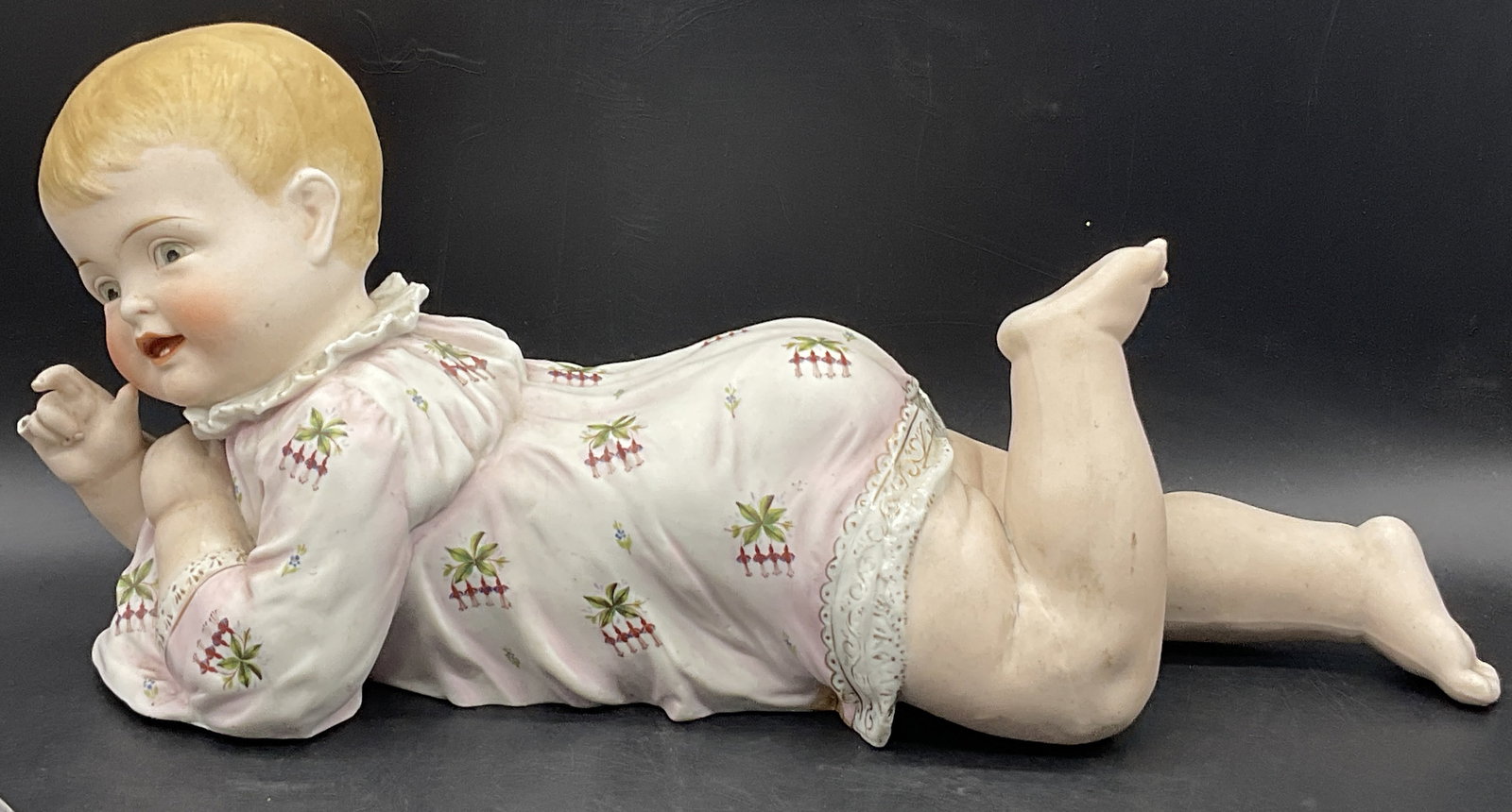 Vintage Hand Painted Ceramic Reclining Infant Fig: Vintage Hand Painted Ceramic Reclining Infant Statue. Measures approx. 6.5H x 15.5W in. Seam present. Chipping, losses, crazing, residue and discoloration present. home decor, home accents, homewares,