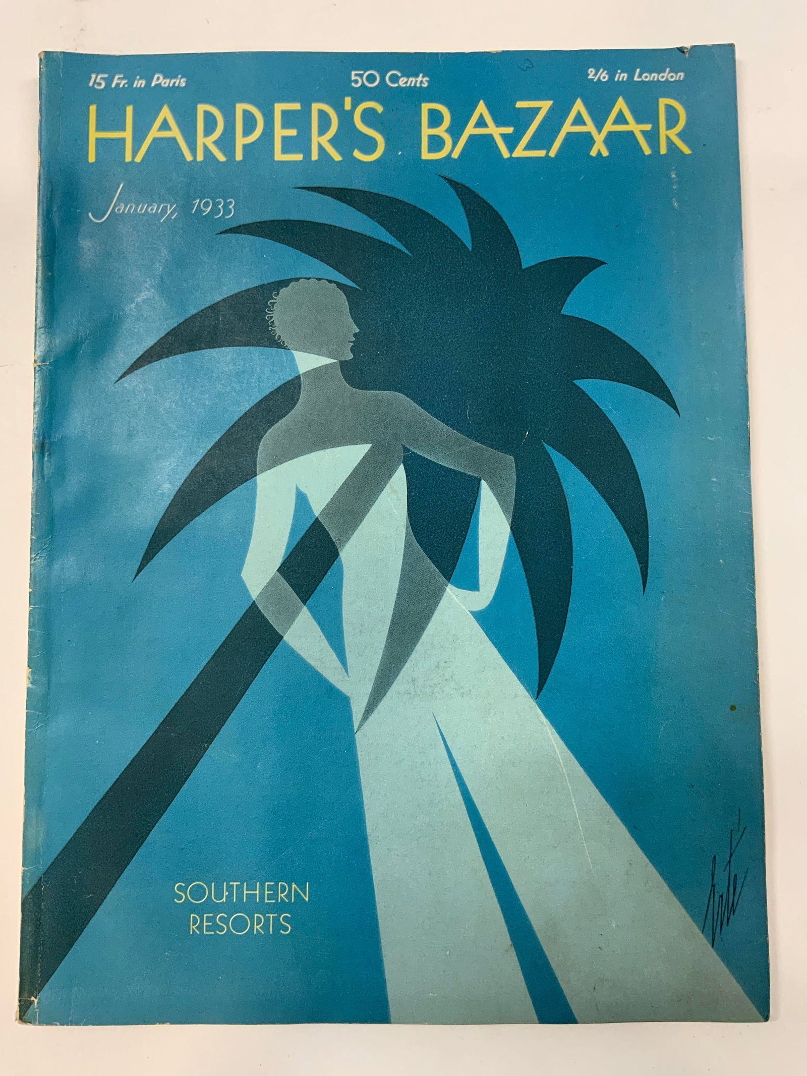 Harpers Bazaar Art Deco Fashion Ad. 1933: Harpers Bazaar Art Deco Fashion Advertisements 1933 Magazine that has illustrations of women woman wearing fashionable clothes. Including as well as fashion advertisements. Publication date: January, 