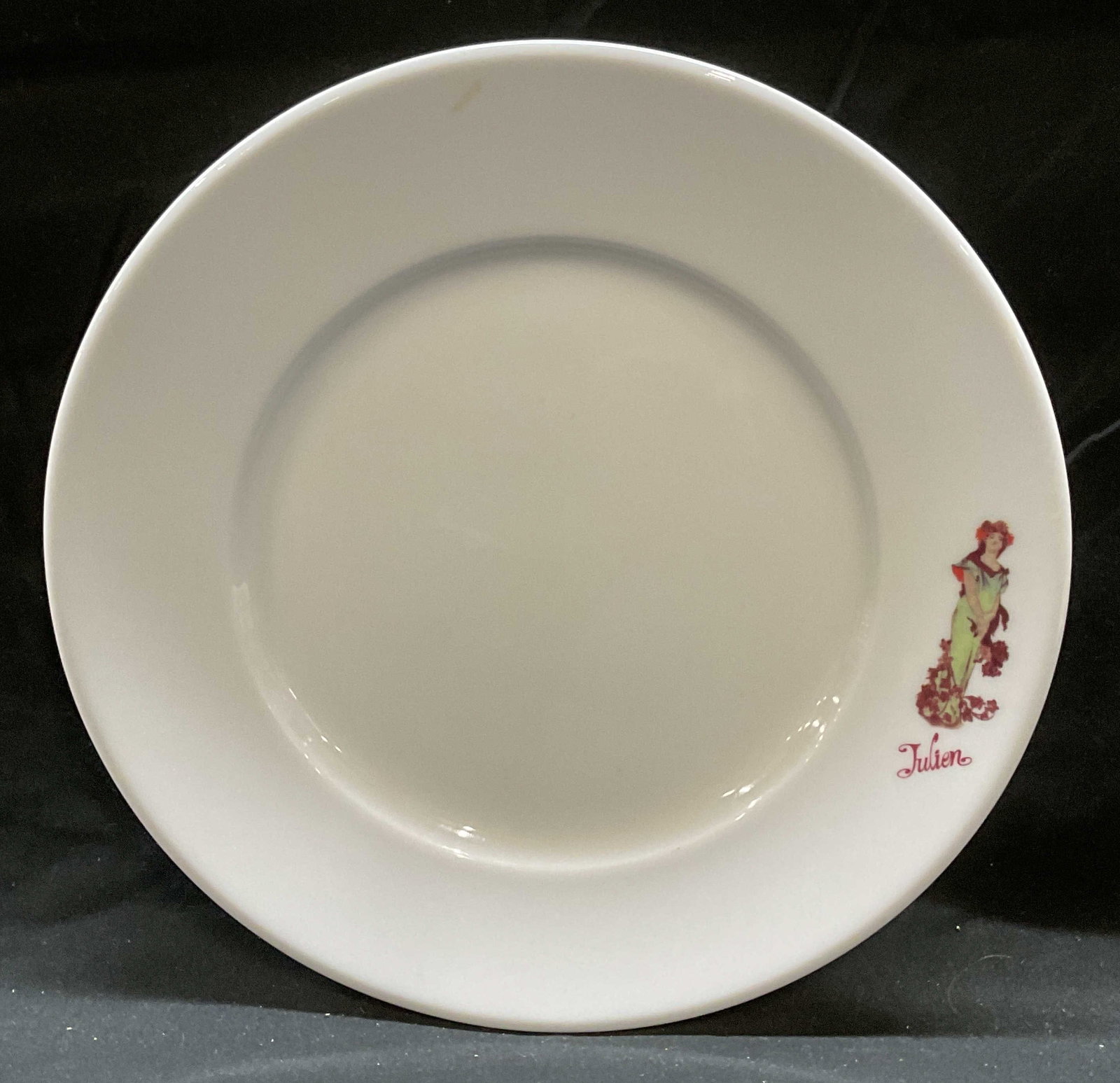 GDA Limoges Porcelain Julien Plate France: GDA Limoges porcelain plate. Julien motif with figure of a woman. Signed on underside. Made in France. Measure approx 10 inches wide. Some scratching observed. GDA Limoges plate, Limoges plate, Julien
