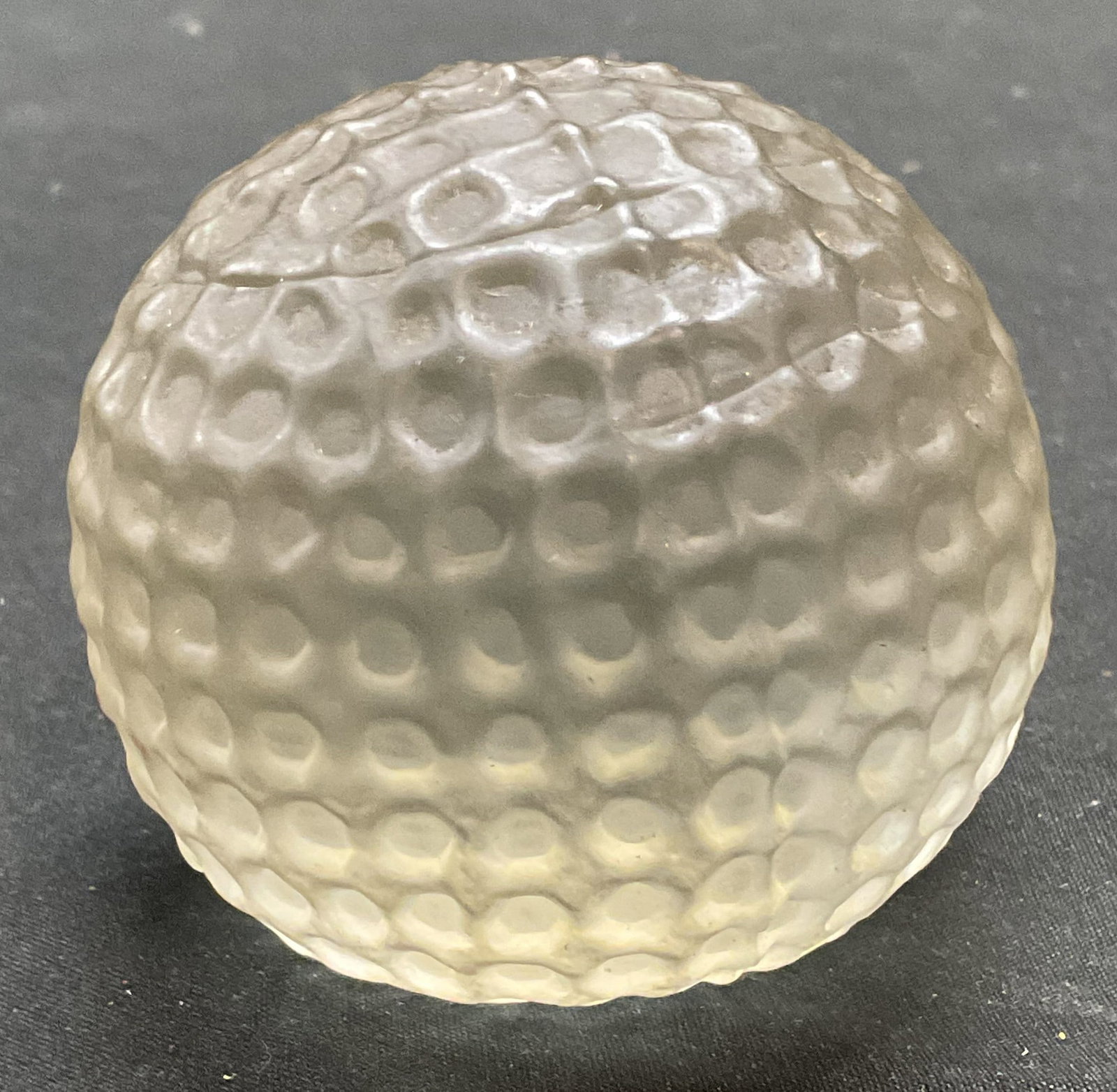 Hand Blown Art Glass Golf Ball Paperweight: Hand blown art glass golf ball motif paperweight. Measures approx 2.5 inches wide. Some scratching observed. Golf ball paperweight, art glass paperweight, decorative arts, home decor, home accessories