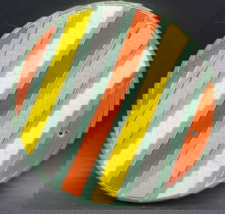 Vintage Striped Round Pottery Trivet: Vintage Striped Round Pottery Trivet. Orange, white, yellow, and green hues to the piece. Glazed. Drilled hole to the top. Measures approx. 7.75L x 7.75W in. Crazing, chipping, pitting, discoloration,