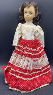 1966 ALEXANDER Vintage Doll W/ Fabric Dress: Vintage Doll With Red & White Fabric Dress. Crafted from a hard plastic material. Brown hair to the doll. Neck reads ALEXANDER 1966. Measures approx. 17H x 5W in. Losses, discoloration, and surface we