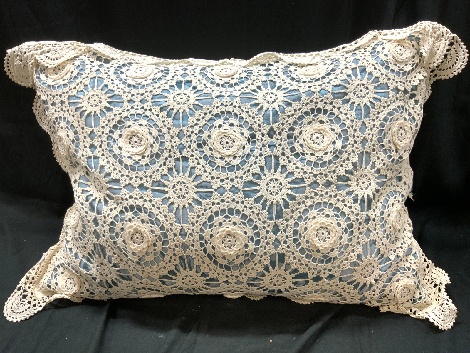 Vintage Crochet Sham & Pillow: Lot includes light blue toned pillows & cream toned crocheted sham. Sham has floral and geometric detail. Pillow is vintage. Measures approximately 26 inches long 16 inches tall. Pillow, sham, pillow 