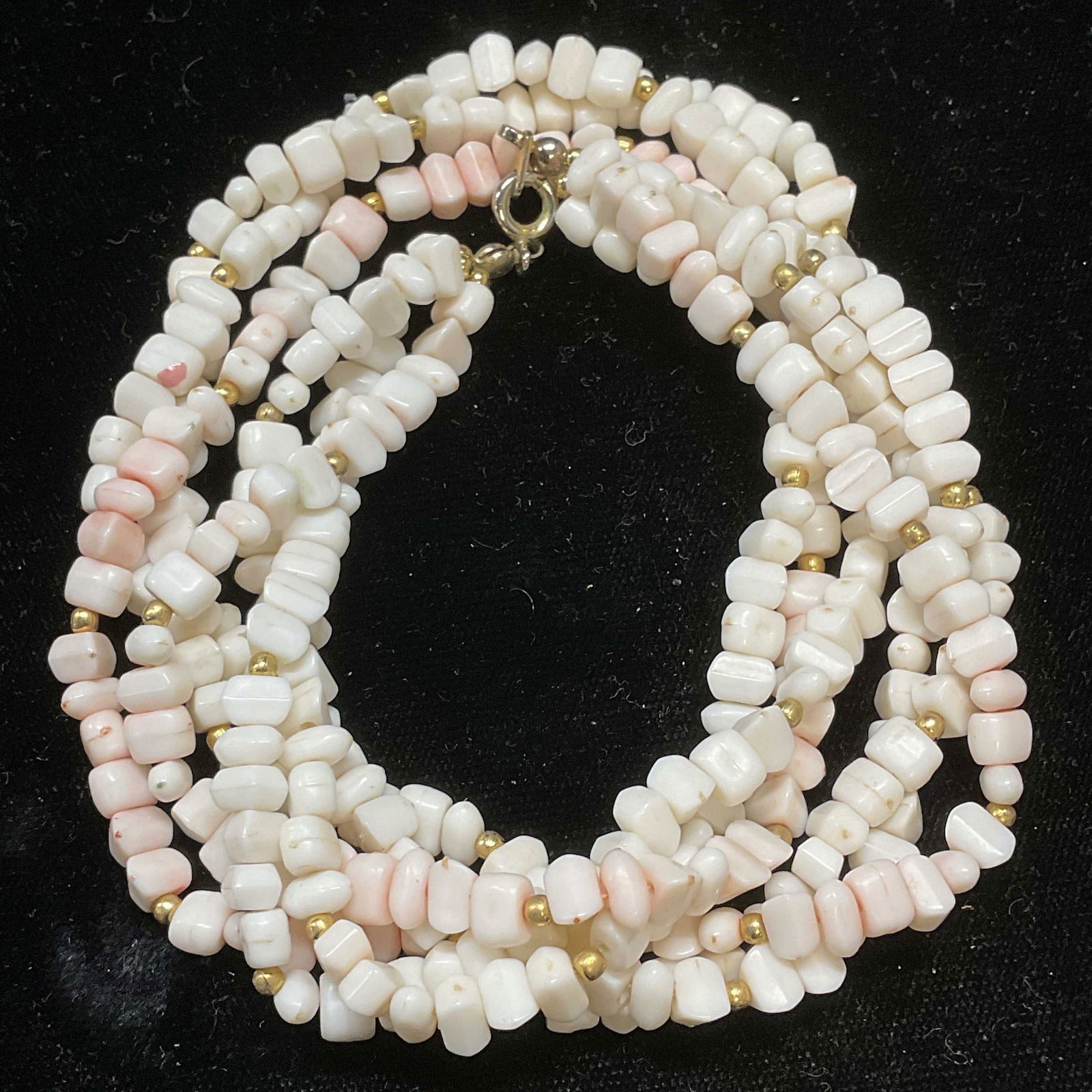 Vintage Pink & White Faux Stone Necklace: Vintage pink and white beaded faux stone necklace with gold tone accents. Drop length approx 9 inches. Some wear including scratching observed. Jewelry, estate jewelry, costume jewelry, cocktail jewel