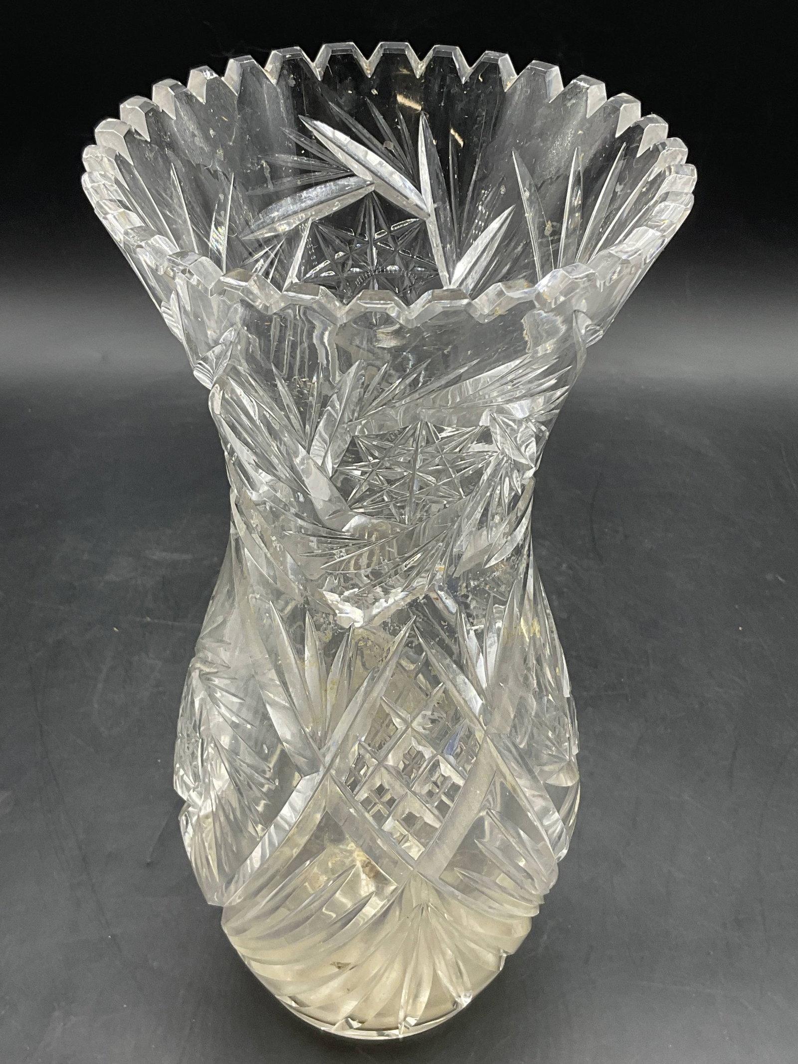 Vintage Cut Crystal Sawtooth Rim Vase: Vintage Cut Crystal Sawtooth Rim Vase. Measures approx, 11H x 5W in. Chipping, residue, and surface wear present. home decor, home accents, homewares, housewares, home accessories, collectibles, Decor