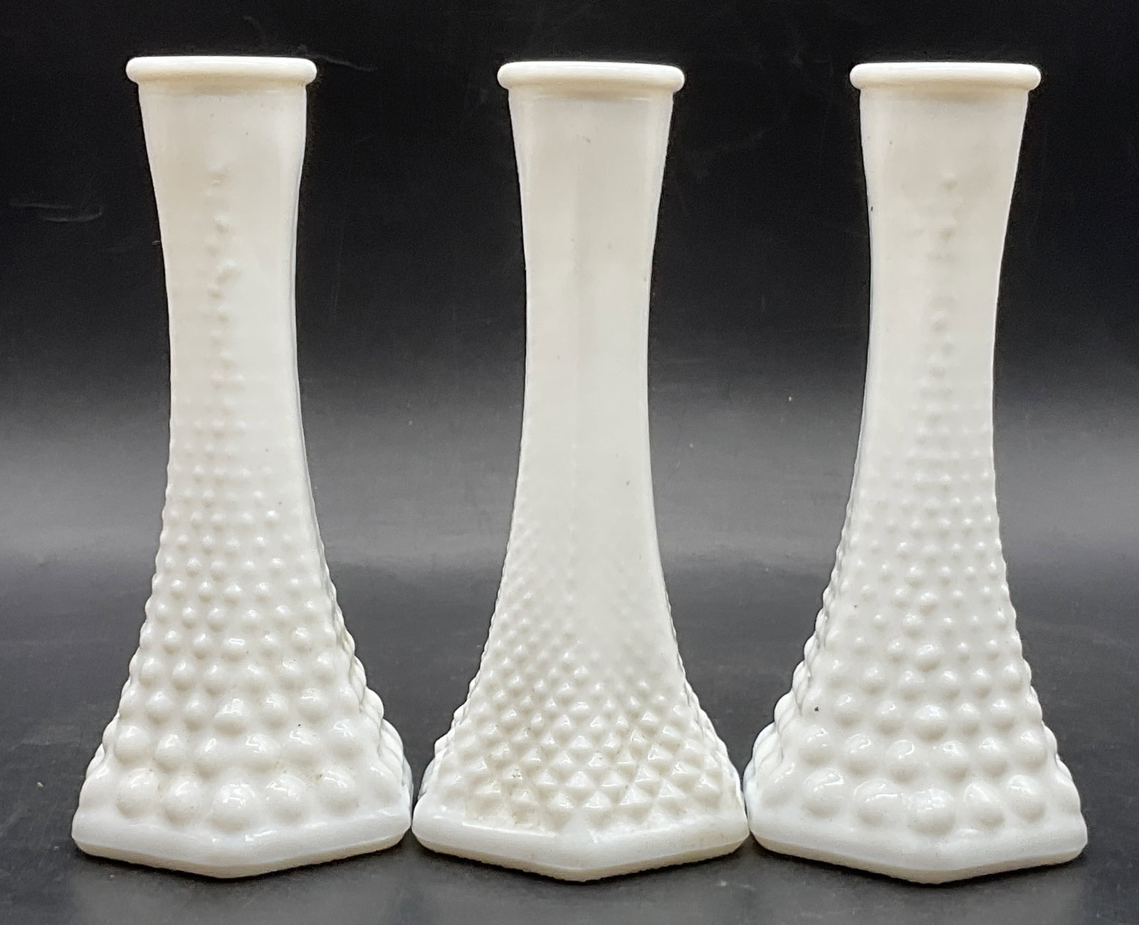 Lot3 EO BRODY USA Vintage Hobnail Milk Glass Vases: Lot 3 E.O. BRODY USA Vintage Hobnail Milk Glass Vases. Undersides are marked E.O. BRODY USA. Measures approx. 6H x 2.5W in. Surface wear consistent with age, use, and exposure. home decor, home accent