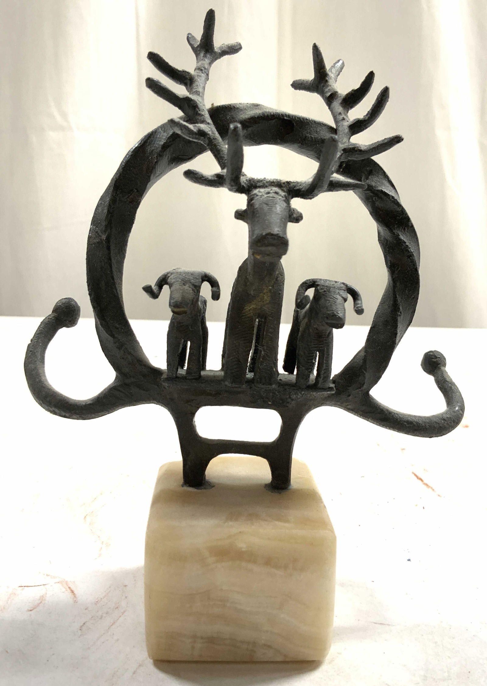 Vtg Cast Iron Deer Fig W Marble Base Buck & Doe: Piece has buck figure with large antlers 2 smaller figures. Base is tan toned marble cube base. Figures appear to be cast iron. Measures approximately 6.25 inches tall 5 inches wide. 2.5 inches deep.