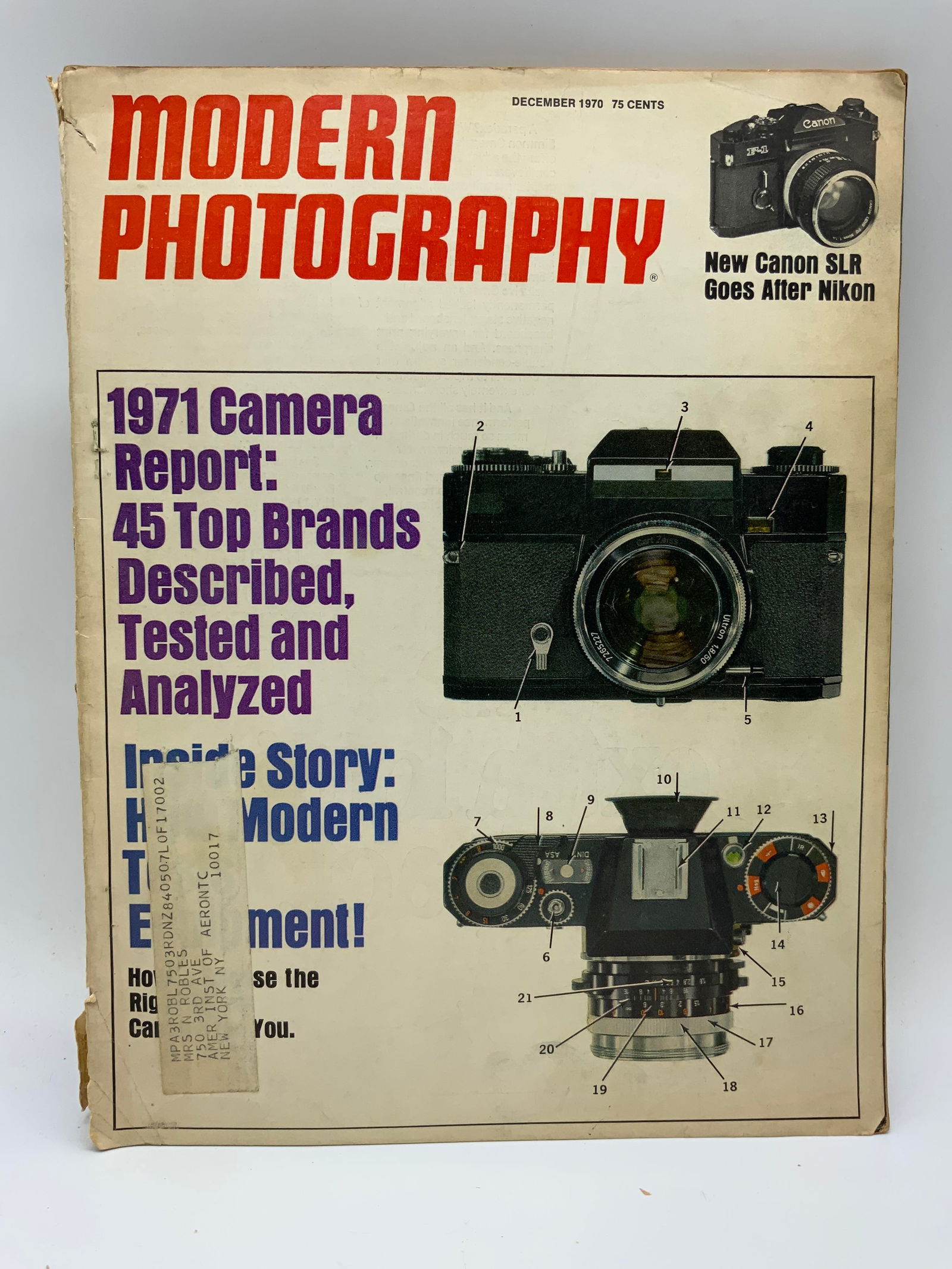 Modern Photography Magazine December 1970 ISSUE: Modern Photography Magazine December 1970 ISSUE Front cover has an illustration of the new Canon SLR. Published in 1970. Magazine has ads & illustrations of cameras. Vol 34 & NO 12. Signed & marked. S