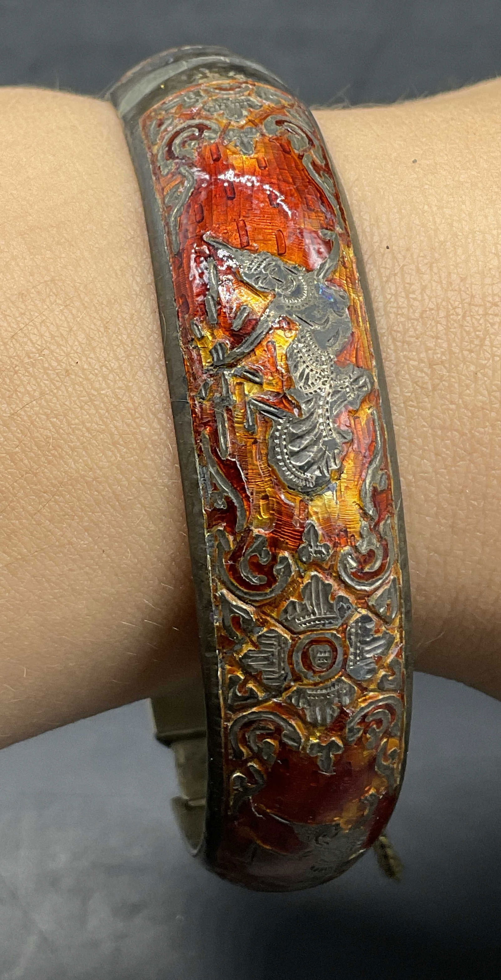 SIAM STERLING Vintage Guilloche Enamel Bracelet: SIAM STERLING Vintage Guilloche Enamel Figural Motif Bracelet. Secures with clasp closure. Safety chain to the piece. Interior marked SIAM STERLING. Diameter measures approx. 2.75 in. Discoloration, s