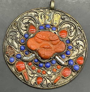Vintage Handmade Natural Stone Figural Talisman: Vintage Handmade Natural Stone Figural Talisman / Pendant. Handcrafted metal with blue, white, and red stones. Carved figure to the center. Red stones are possibly coral. Measures approx. 2.5L x