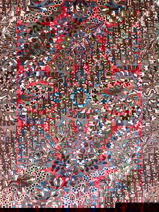 Vintage Handmade Persian Wool Area Rug: Rug is handmade & wool. Piece has intricate multi toned floral motif & geometric detail. Edges of rug have cream toned fringes. Rug is vintage. Piece measures approx 56 inches long 26 inches wide. Rug