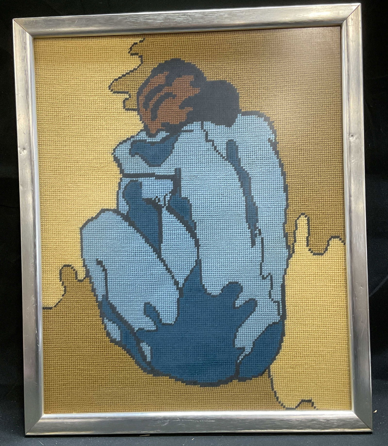 Framed Needlepoint Female Nude Textile Art: Framed needlepoint panel. Textile art. Female nude in blue. Silver tone frame. Not examined out of frame. Frame measures approx 16.75 x 13.75 inches. Some wear consistent with exposure. Art, textile a