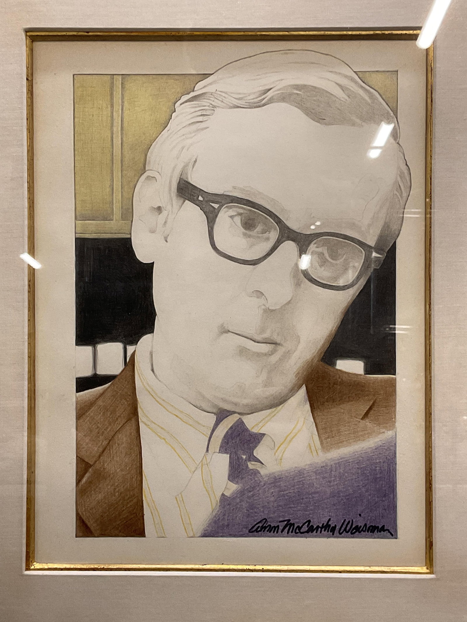 Signed McCarthy Portrait of Man Drawing: Framed and matted graphite and color drawing. Signed at lower right, partially legible, reads Ann McCarthy. Gilt wood frame. Not examined out of frame. Frame measures approx 18.5 x 15.5 inches. Some c