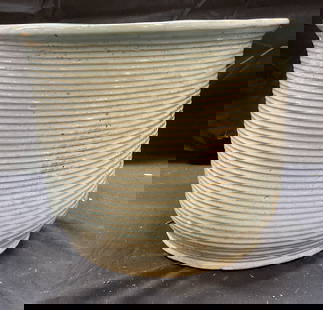Heavy Green Ribbed Ceramic Planter: Green glazed ribbed ceramic planter. Piece is heavy. Measures approx 11 x 9.5 inches. Marked on underside 10 08. . Some scratching and residue. Some chipping. Planter, ceramic planter, homewares, home