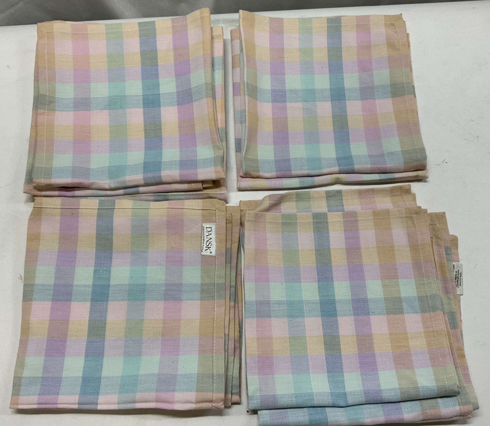 9 DANSK Ritva Puotila Plaid Pattern Napkins: 9 DANSK Ritva Puotila Plaid Pattern Napkins 9 DANSK napkins designed by RITVA PUOTILA. Napkins have a plaid pattern with vertical & horizontal lines. Colors including, pink, light blue & more. Signed