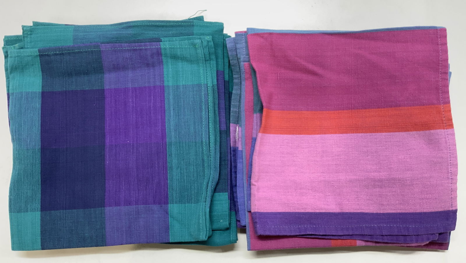 14 Piers 1 Imports Plaid Pattern Napkins INDIA: 14 Piers 1 Imports Plaid Pattern Napkins INDIA 14 Piers 1 Imports napkins. Napkins have a plaid pattern with vertical lines. Colors including, pink, purple, teal, red & more. Signed & marked. Surface