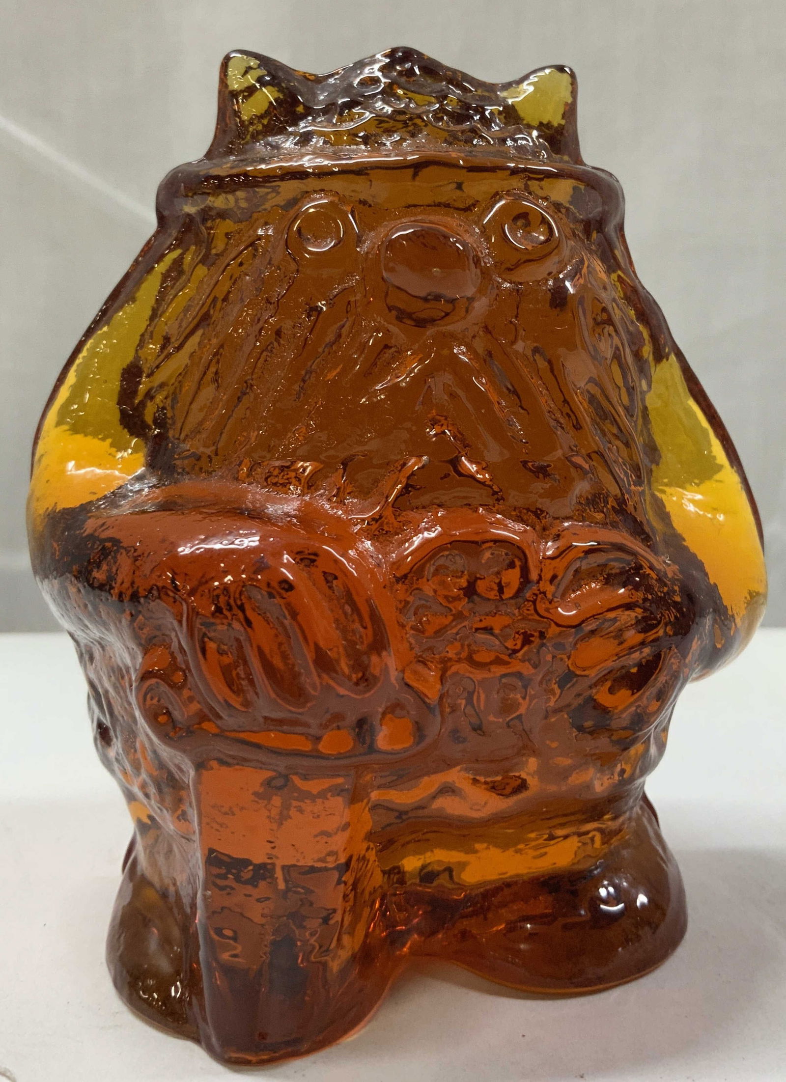 Vintage Amber Glass Viking Figurine SWEDEN: Vintage Amber Glass Viking Figurine SWEDEN Figurine is shaped as a Viking & has an amber color. Made out of glass. MADE IN SWEDEN. Signed & marked. Surface wear consistent to age, use & exposure. Meas
