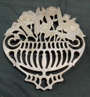 Piero Maestri Silver Plated Floral Trivet, Italy: Vintage Piero Maestri silver plated trivet. Pierced floral motif. Signed on underside. Made in Italy. Measures approx 8.5 x 8 inches. Scratching and patina observed. Piero Maestri, Piero Maestri trive