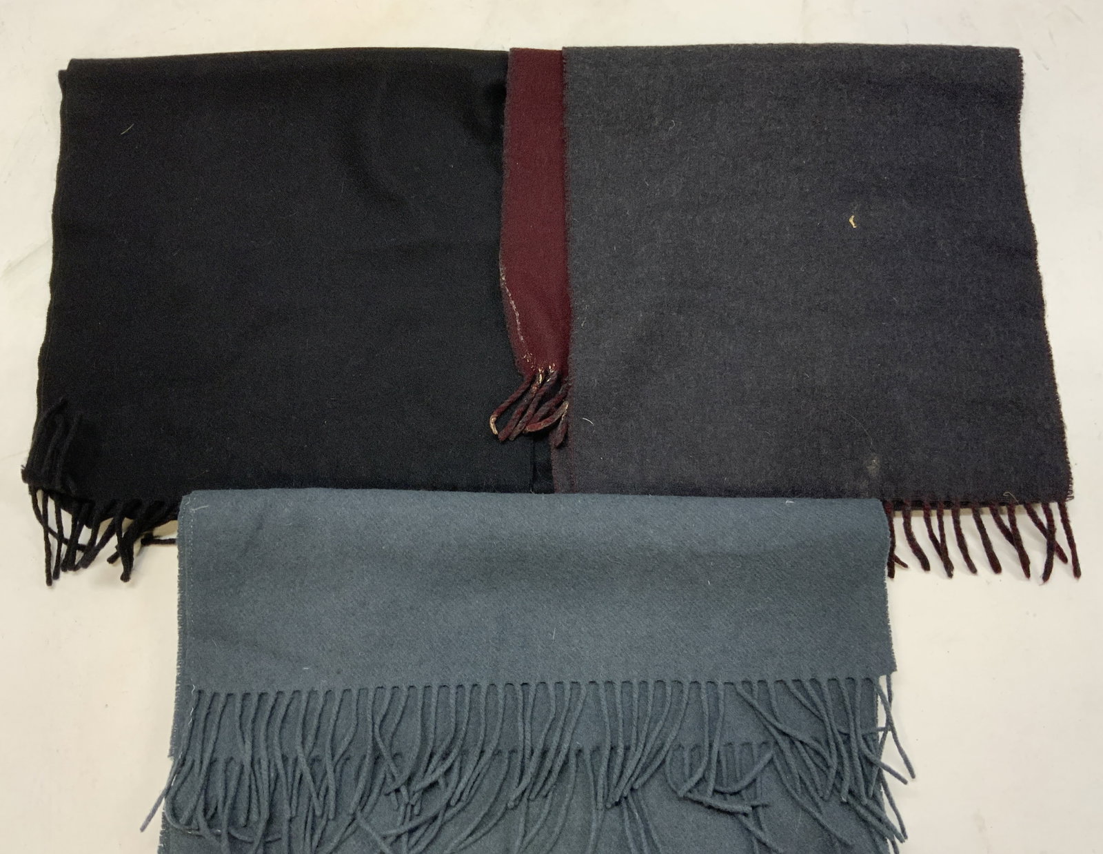 3 Cashmere Black&Navy Scarves CXIII by LeoCerruti+: 3 black & grey scarves. One scarf reads CXIII by Leo Cerruti. 100% cashmere. Surface wear consistent to age, use & exposure. Measurements: length 47.5in x width 12.1in. Womens fashion accessories, wom