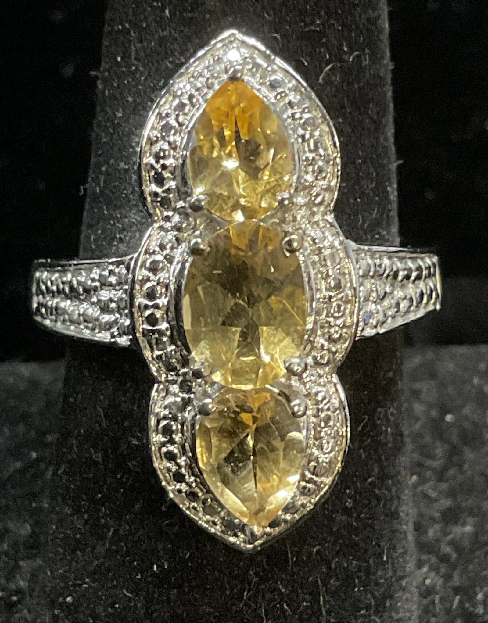 Signed Karis Silver Tone Citrine Ring: Signed Karis silver tone ring with citrine semiprecious stones. Ring size 7. Some wear including scratching observed. Jewelry, estate jewelry, fashion jewelry, cocktail jewelry, costume jewelry, acces