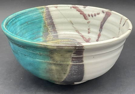 JS 89 Signed Vintage Handmade Pottery Bowl: JS 89 Signed Vintage Handmade Pottery Bowl. Underside signed JS 89. Primarily blue, purple, and off white hues. Pitting and surface wear present. Measures approx. 3.5H x 7.75W in. home decor, home acc
