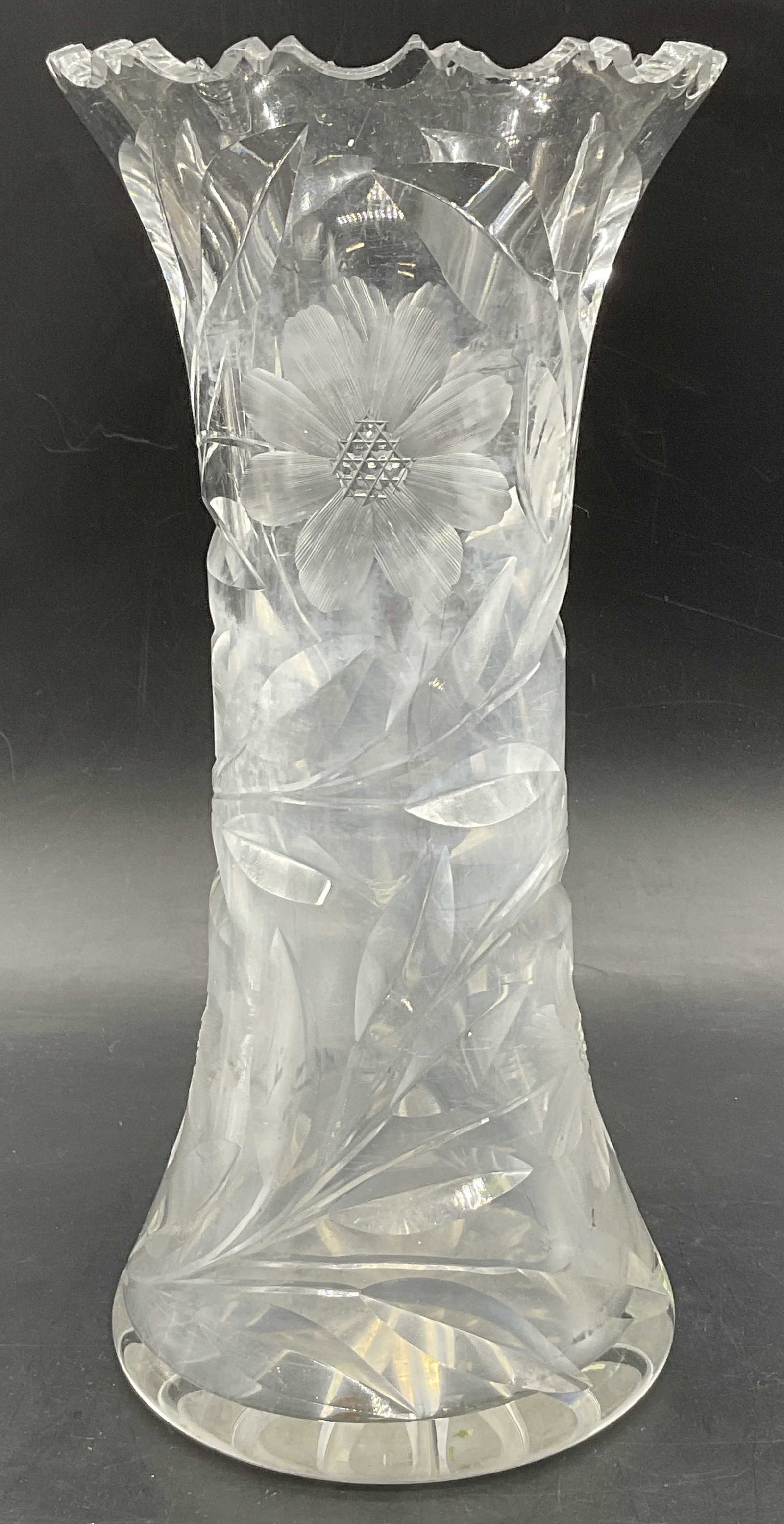Vintage Cut Art Glass Floral Motif Vase: Vintage Cut Art Glass Floral Motif Vase. Cut florals and foliage to the glass. Measures approx. 10H x 4.75W in. Chipping, residue, surface wear, and discoloration present. home decor, home accents, ho