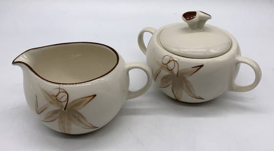 Winfield China Passion Flower Cream&Sugar Bowl USA: Winfield China Passion Flower Creamer&Sugar BowlCreamer & sugar bowl that have a passion flower pattern. Pieces are hand-crafted. Underside is signed & marked. Reads WINFIELD CHINA. California. Surfac