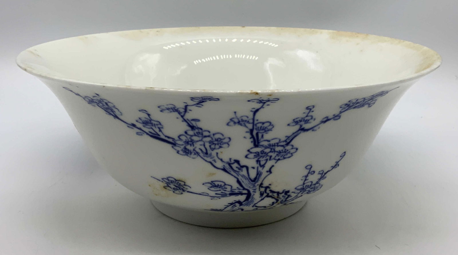 Lenox Smithsonian ChingDynasty Flowering Tree Bwl: Lenox Smithsonian ChingDynasty Flowering Tree Bowl Bowl that features blue & white designs depicting a flowering tree. Underside is signed & marked. Reads Ching Dynasty Bowl. A reproduction of Ching D