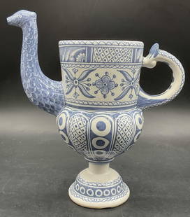 ESTRELA DE CONIMBRIGA PORTUGAL Pottery Pitcher: ESTRELA DE CONIMBRIGA PORTUGAL Hand Painted Pottery Pitcher. Serpentine headed spout. Decorated with florals, foliage, and geometric patterns. Underside reads 208 ESTRELA DE CONIMBRIGA PORTUGAL. Other